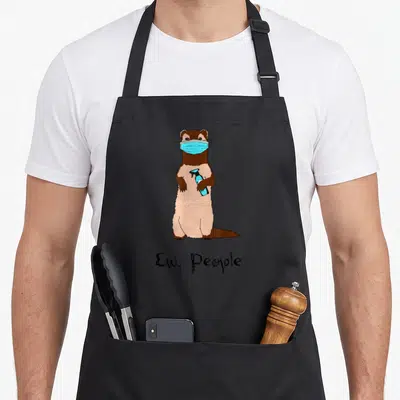 Mask face apron - Cartoon ferret in blue mask holding spray bottle with Ew People text — shown on a black cotton canvas apron against a white background