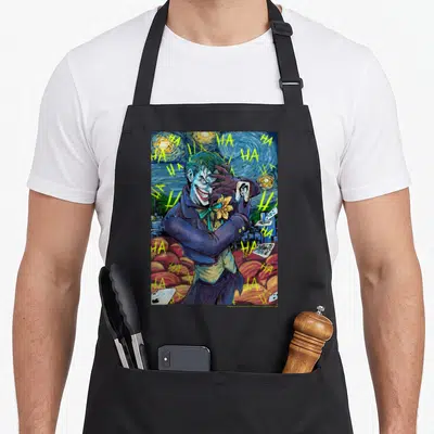 Portrait style starry apron - The Joker holding playing card surrounded by HA text and swirling starry sky in purple — shown on a black cotton canvas apron against a white background