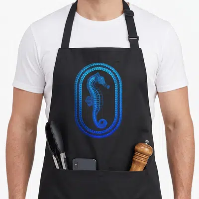 Seahorse hawaiian apron - Blue line art seahorse inside tribal oval frame on black apron — shown on a black cotton canvas apron against a white background