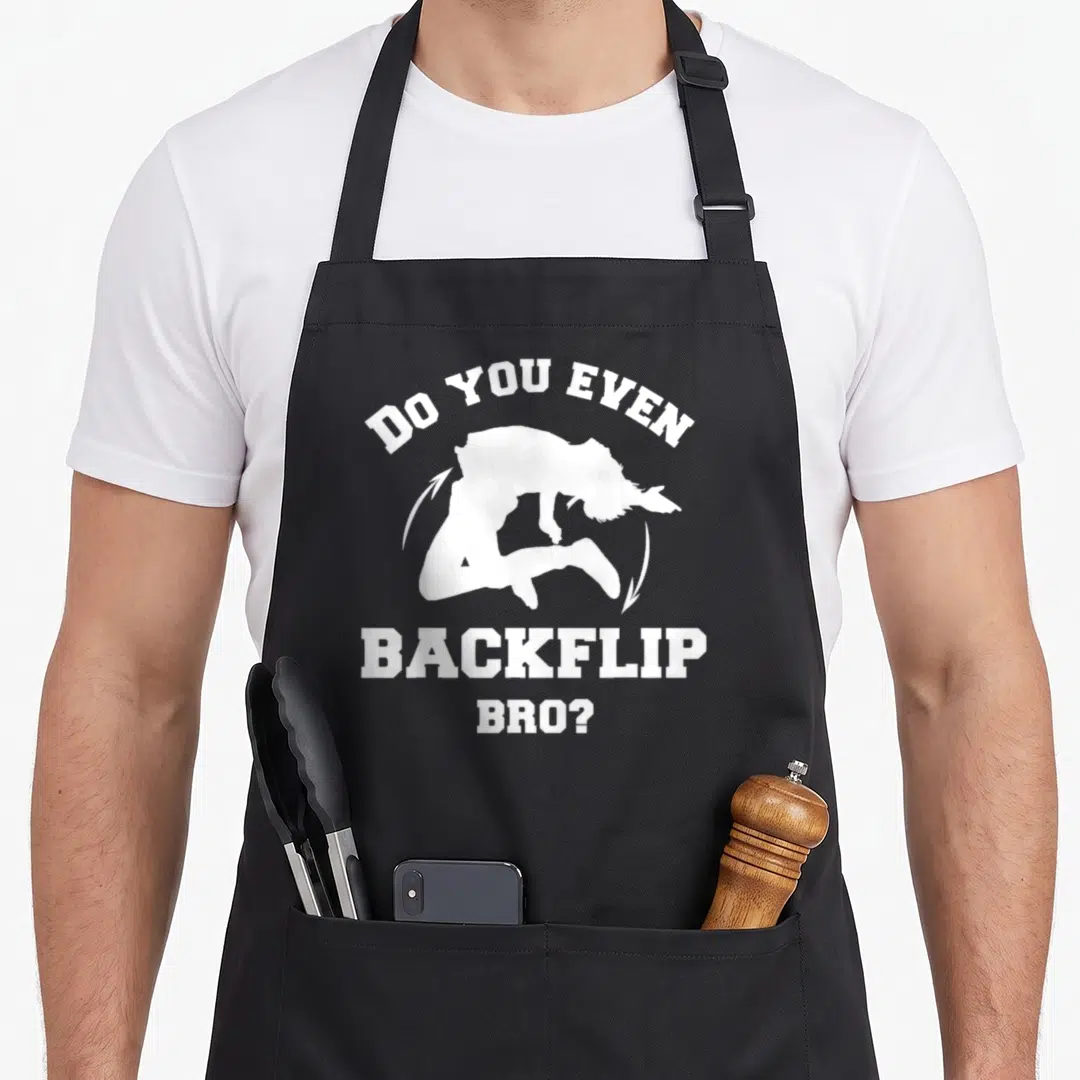 Even calisthenics apron - White text DO YOU EVEN BACKFLIP BRO with person silhouette inside partial circle — shown on a black cotton canvas apron against a white background