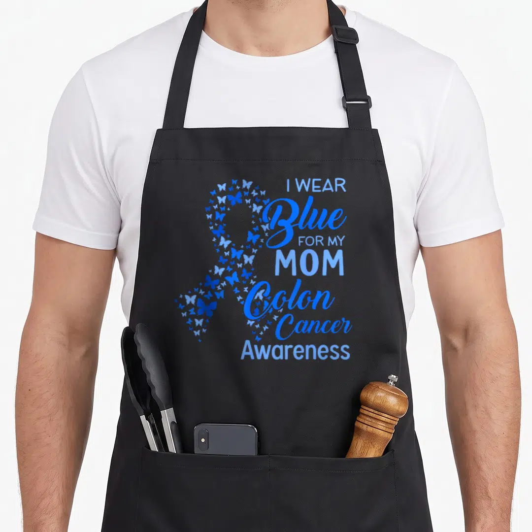 Blue i love tribute apron - Blue butterfly awareness ribbon next to I Wear Blue For My Mom Colon Cancer Awareness text — shown on a black cotton canvas apron against a white background