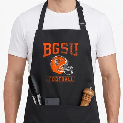 Bowling football apron - Distressed orange BGSU football helmet graphic with text on black bib — shown on a black cotton canvas apron against a white background