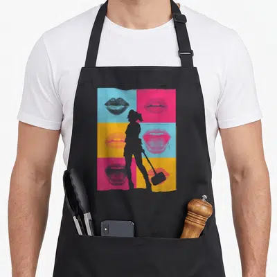 Lip vehicle apron - Grey woman silhouette holding hammer over pink blue yellow halftone lips grid — shown on a black cotton canvas apron against a white background