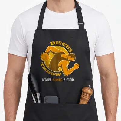 Discus track apron - Minimalist discus thrower in yellow circle with text DISCUS THROW BECAUSE RUNNING IS STUPID — shown on a black cotton canvas apron against a white background