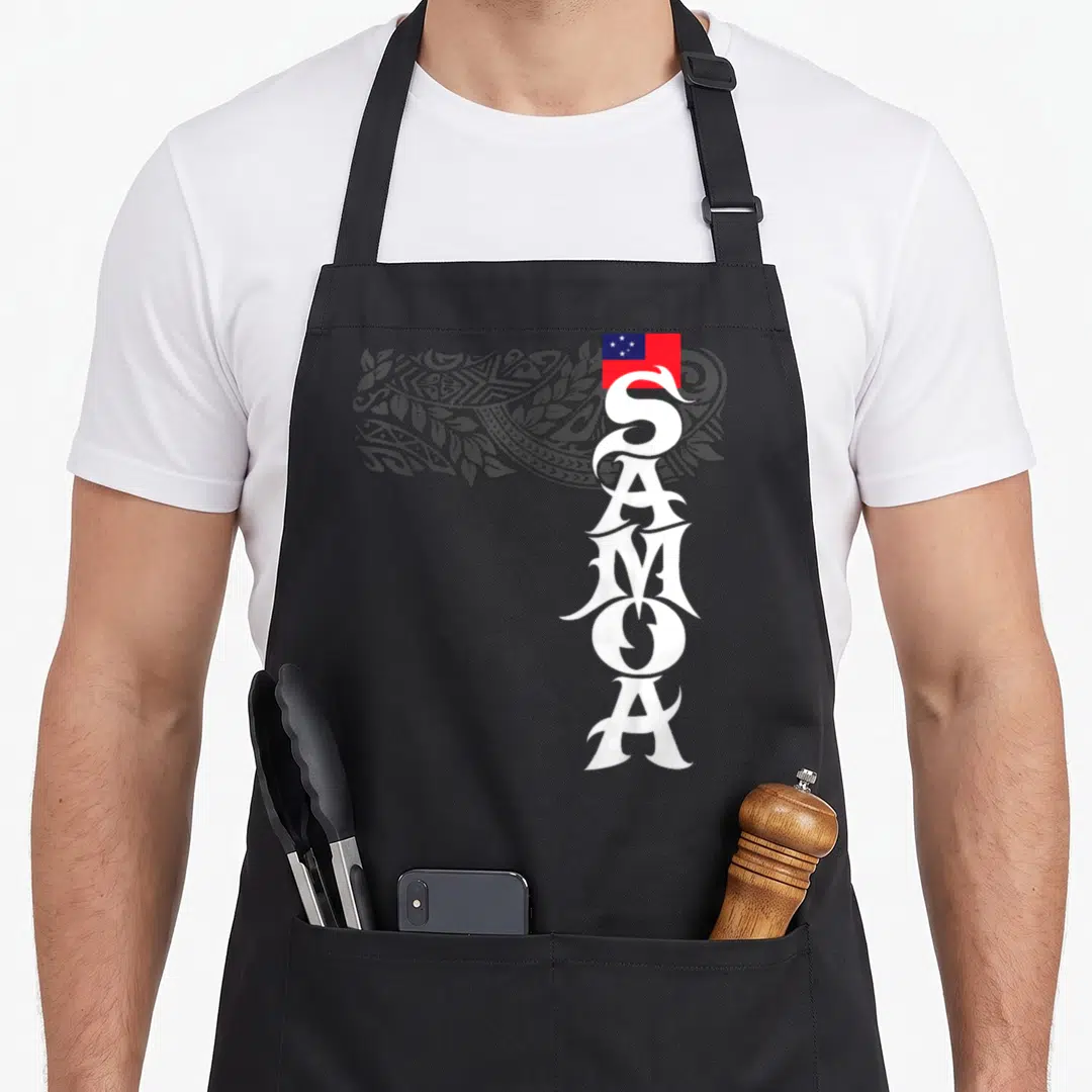 Island samoa apron - Vertical white SAMOA text, grey tribal pattern, and red blue white flag — shown on a black cotton canvas apron against a white background