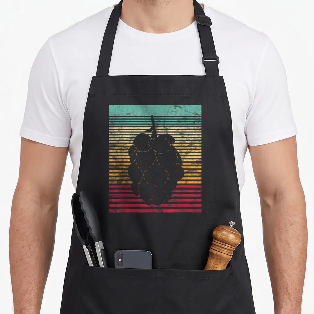 Craft father day apron - Grey hop cone silhouette over retro teal yellow orange red horizontal stripes — shown on a black cotton canvas apron against a white background