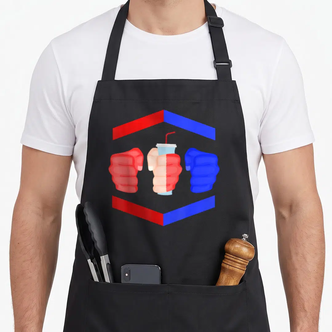 Gamebred soda apron - Three fists in red blue white cartoon style with center fist holding a drink cup — shown on a black cotton canvas apron against a white background