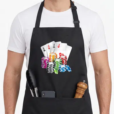 Chip casino aprons - Four aces fanned behind stacks of white red blue green purple orange poker chips — shown on a black cotton canvas apron against a white background