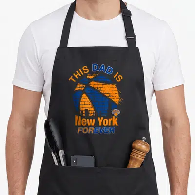 York father day apron - Basketball with blue brick pattern and orange text reading This Dad Is New York Forever — shown on a black cotton canvas apron against a white background