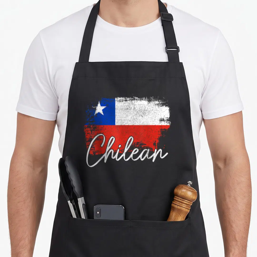 Chile flag pride apron - Distressed Chilean flag with white script text in red white and blue — shown on a black cotton canvas apron against a white background