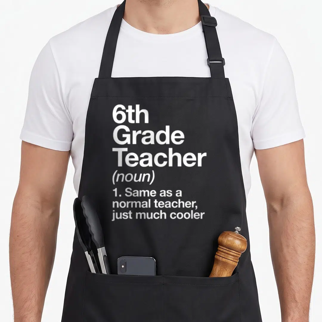 6th grade teacher apron - White stacked text reading 6th Grade Teacher definition on black bib apron — shown on a black cotton canvas apron against a white background