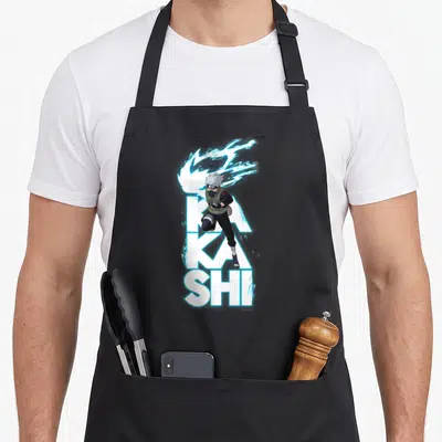 Kakashi novelty apron - Kakashi character with blue lightning in front of stacked white KAKASHI text — shown on a black cotton canvas apron against a white background