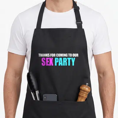Funny gender apron or apron - Thanks for coming to our sex party text in white pink blue stacked typography — shown on a black cotton canvas apron against a white background