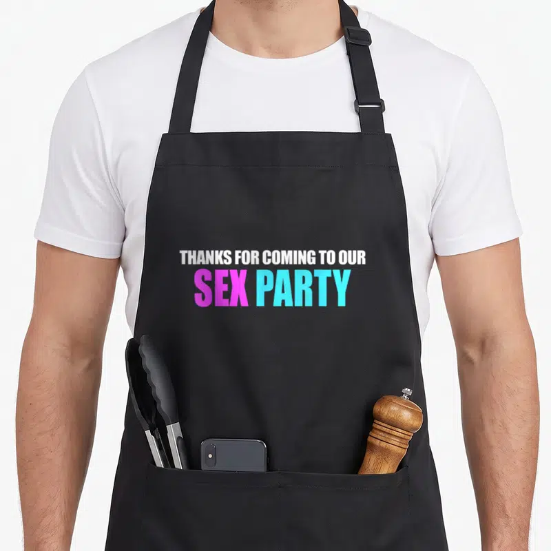 Funny gender apron or apron - Thanks for coming to our sex party text in white pink blue stacked typography — shown on a black cotton canvas apron against a white background