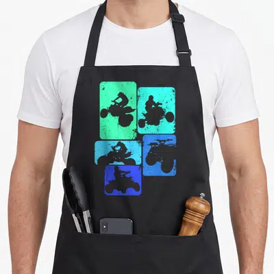 Atv biker apron - Five grey ATV rider silhouettes inside staggered green and blue rounded rectangles — shown on a black cotton canvas apron against a white background