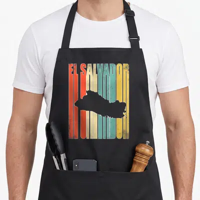 Funny salvador el cook apron - Retro map of El Salvador on colorful vertical stripes — shown on a black cotton canvas apron against a white background