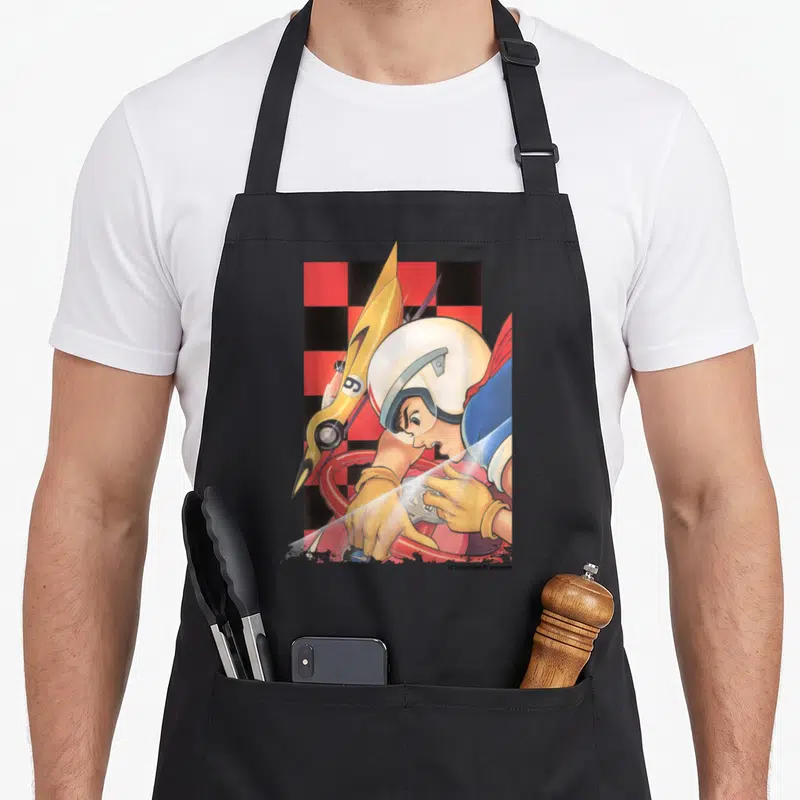 Manga red checkered apron - Retro driver white helmet red steering wheel yellow car number 9 red black checkered — shown on a black cotton canvas apron against a white background