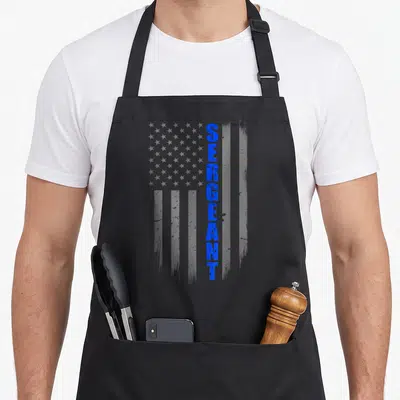Sergeant police apron - Vertical SERGEANT in blue over distressed grey flag with single blue stripe — shown on a black cotton canvas apron against a white background