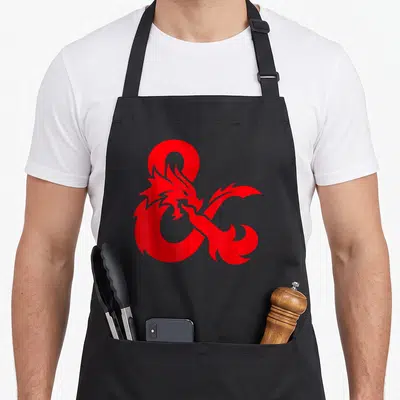 Funny ampersand logo apron - Red dragon forming an ampersand symbol in minimalist style — shown on a black cotton canvas apron against a white background