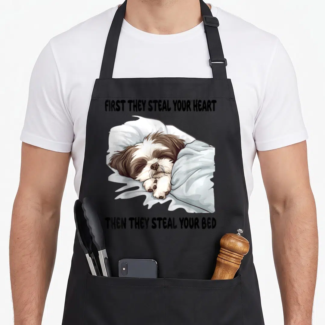 Sleeping shih tzu apron - Cartoon shih tzu sleeping under blanket with quote first they steal your heart then they — shown on a black cotton canvas apron against a white background