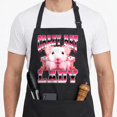 Mouse 90s apron - CRAZY RAT LADY text with three realistic white rats in pink and white gradients — shown on a black cotton canvas apron against a white background