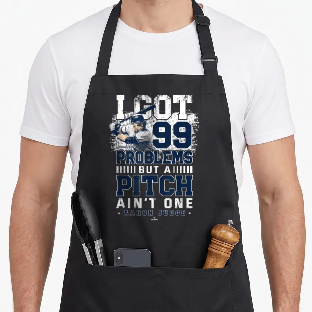 Pitch new york apron - I GOT 99 PROBLEMS BUT A PITCH AIN'T ONE Aaron Judge baseball player navy white distressed — shown on a black cotton canvas apron against a white background