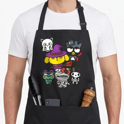 Character costume halloween apron - Six cartoon costumed animals including witch dog, ghost cat, vampire owl, zombie — shown on a black cotton canvas apron against a white background