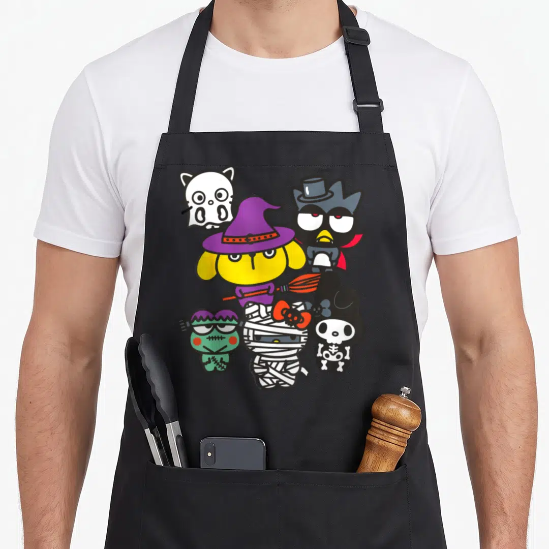 Character costume halloween apron - Six cartoon costumed animals including witch dog, ghost cat, vampire owl, zombie — shown on a black cotton canvas apron against a white background