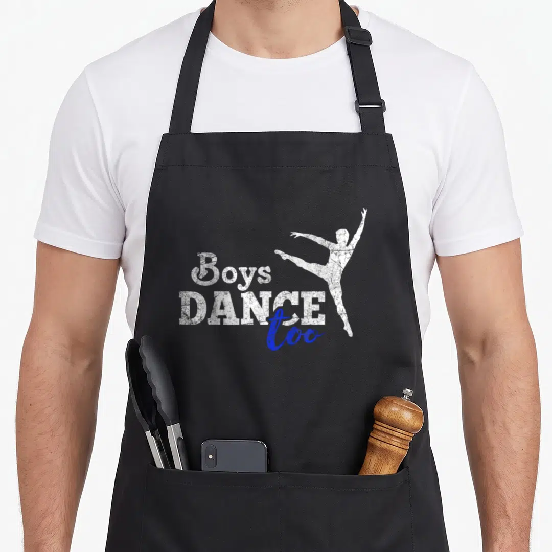 Funny dancer ballet dance apron - Stacked Boys DANCE too text with blue script and white distressed dancer silhouette — shown on a black cotton canvas apron against a white background