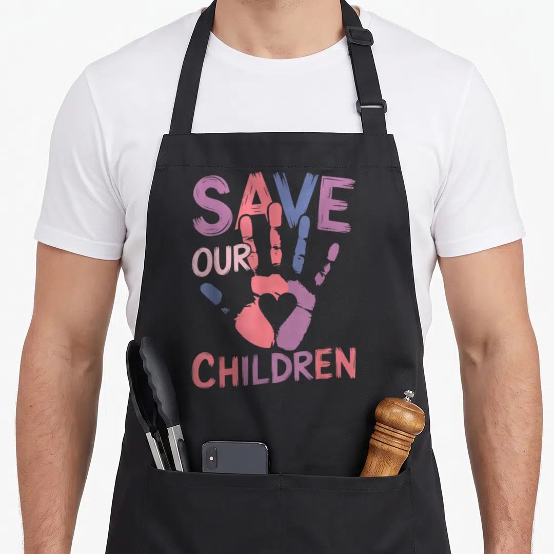 Vintage save human trafficking awareness apron - Distressed handprint with heart inside palm and text SAVE OUR CHILDREN — shown on a black cotton canvas apron against a white background