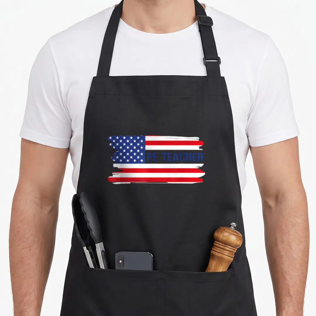 Physical american flag apron - Distressed USA flag with blue PE TEACHER text overlay — shown on a black cotton canvas apron against a white background