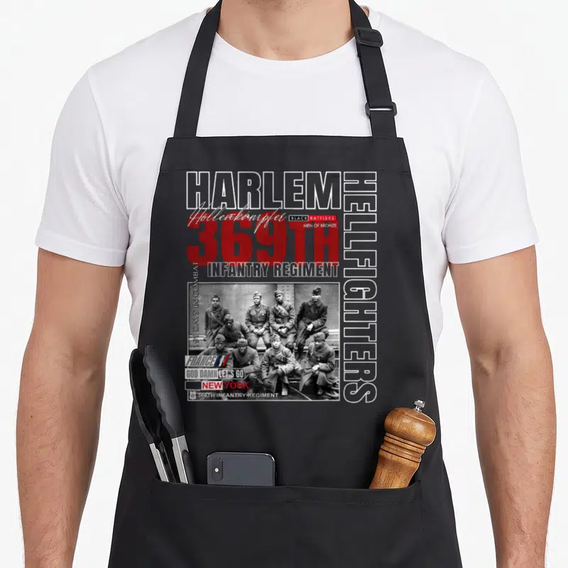 Legacy soldier apron - Vintage soldiers photo surrounded by 369th Infantry Regiment and Harlem Hellfighters text in red — shown on a black cotton canvas apron against a white background