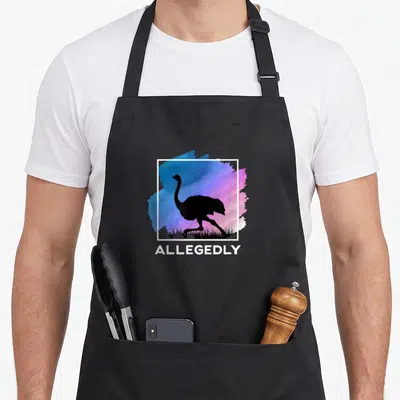 Flightless bird apron - Black emu silhouette on blue purple pink watercolor splash with white ALLEGEDLY text below — shown on a black cotton canvas apron against a white background
