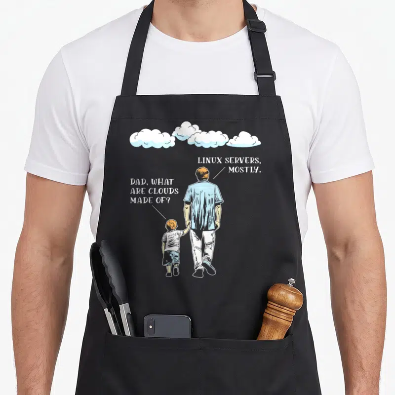 Cloud developer problems apron - Father and son walking under three clouds with speech bubbles about Linux servers — shown on a black cotton canvas apron against a white background
