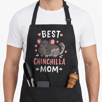 Chinchilla mother's day aprons - Cartoon grey chinchilla with pink hearts and text Best Chinchilla Mom — shown on a black cotton canvas apron against a white background
