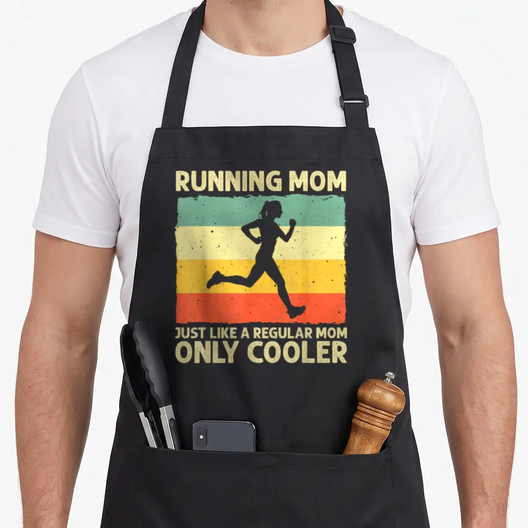 Running racing apron - Retro woman silhouette on beige green yellow orange red stripes with Running Mom text — shown on a black cotton canvas apron against a white background