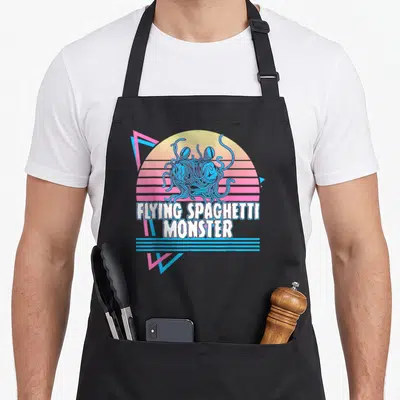 Monster pastafari flying apron - Blue spaghetti monster over striped sun with FLYING SPAGHETTI MONSTER text — shown on a black cotton canvas apron against a white background