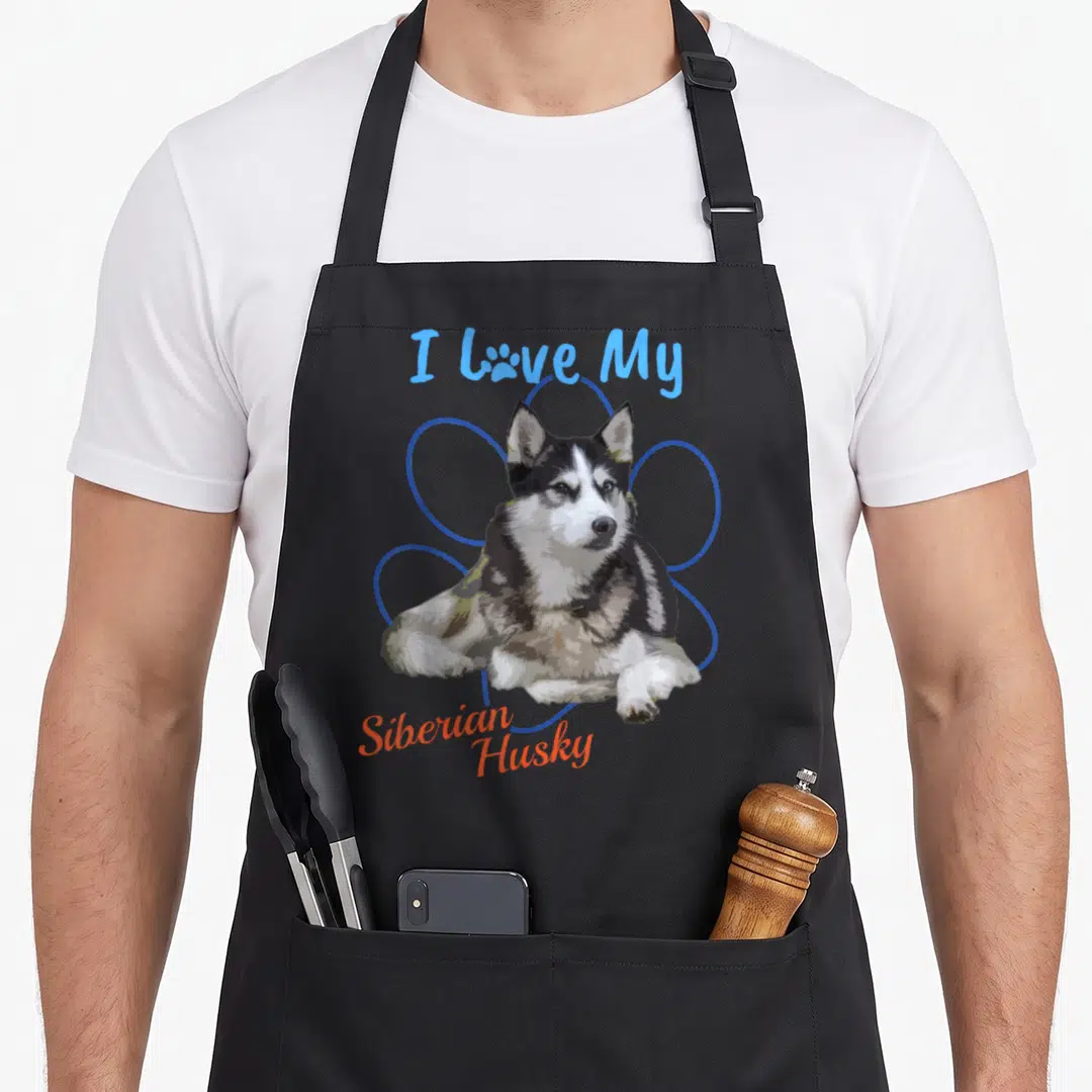 Siberian paw print apron - Realistic husky with I Love My text and blue flower outline — shown on a black cotton canvas apron against a white background