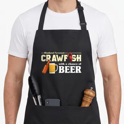 Weekend crawfish apron - Stacked text Weekend Forecast Crawfish Beer with red crayfish and beer bottle mug illustration — shown on a black cotton canvas apron against a white background