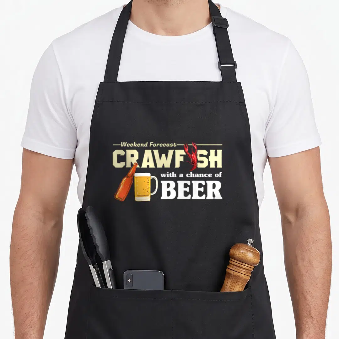 Weekend crawfish apron - Stacked text Weekend Forecast Crawfish Beer with red crayfish and beer bottle mug illustration — shown on a black cotton canvas apron against a white background