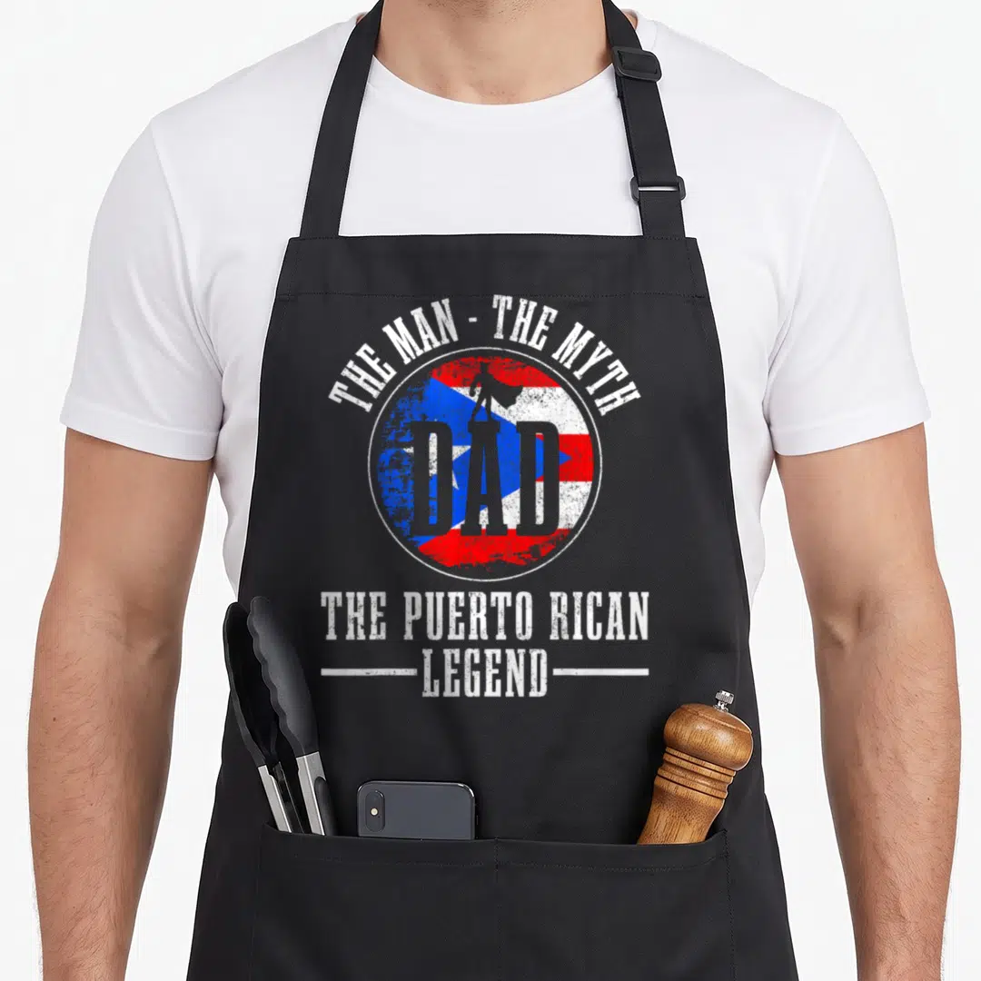 Myth pride apron - Circular red white blue flag with grey DAD silhouette and distressed white text — shown on a black cotton canvas apron against a white background