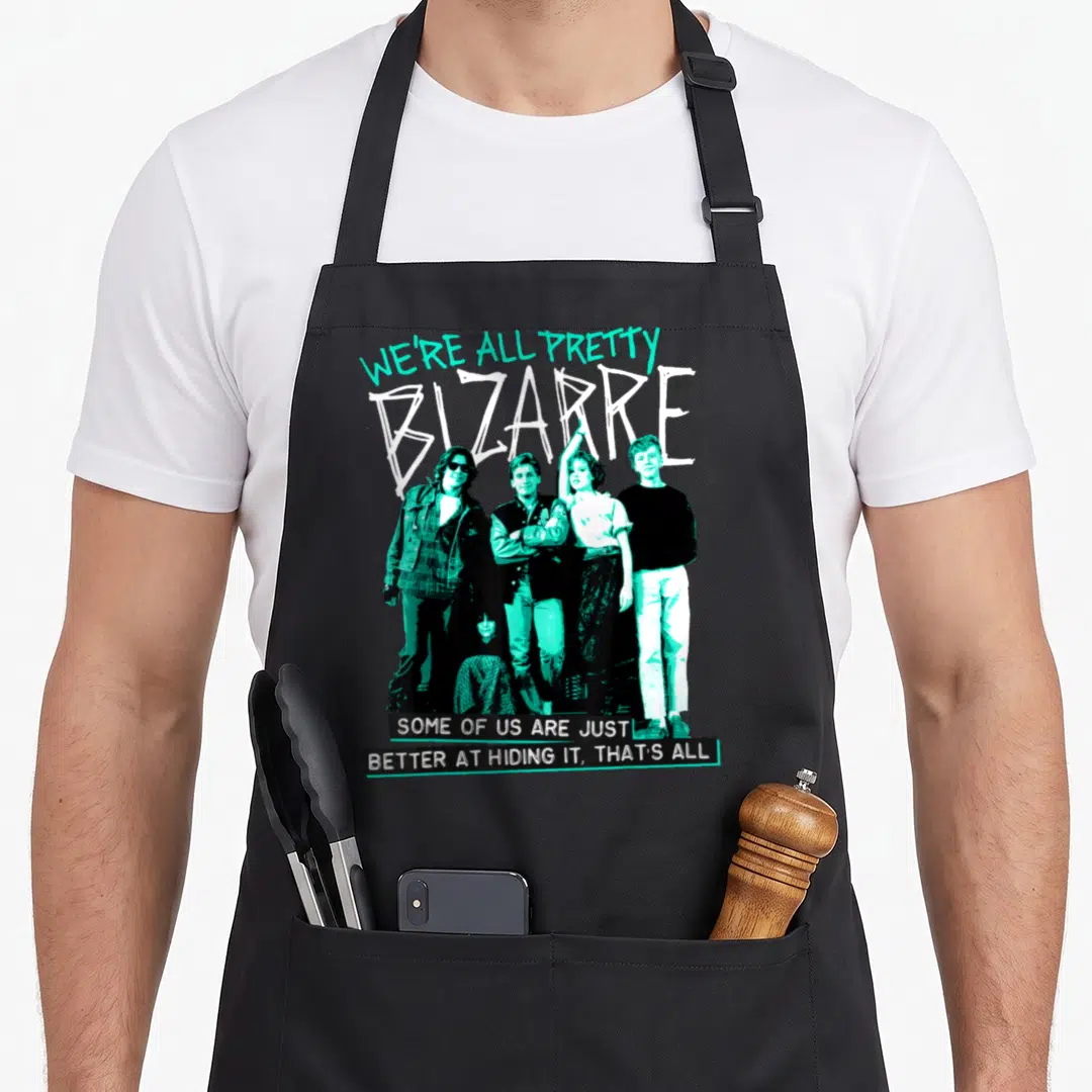 Bizarre pretty apron - Cyan and black group photo with We're All Pretty Bizarre text overlay — shown on a black cotton canvas apron against a white background