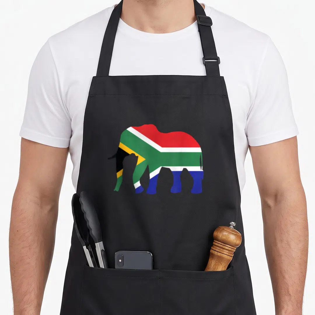 Elephant south african apron - Elephant silhouette filled with South African flag colors red green blue yellow white — shown on a black cotton canvas apron against a white background