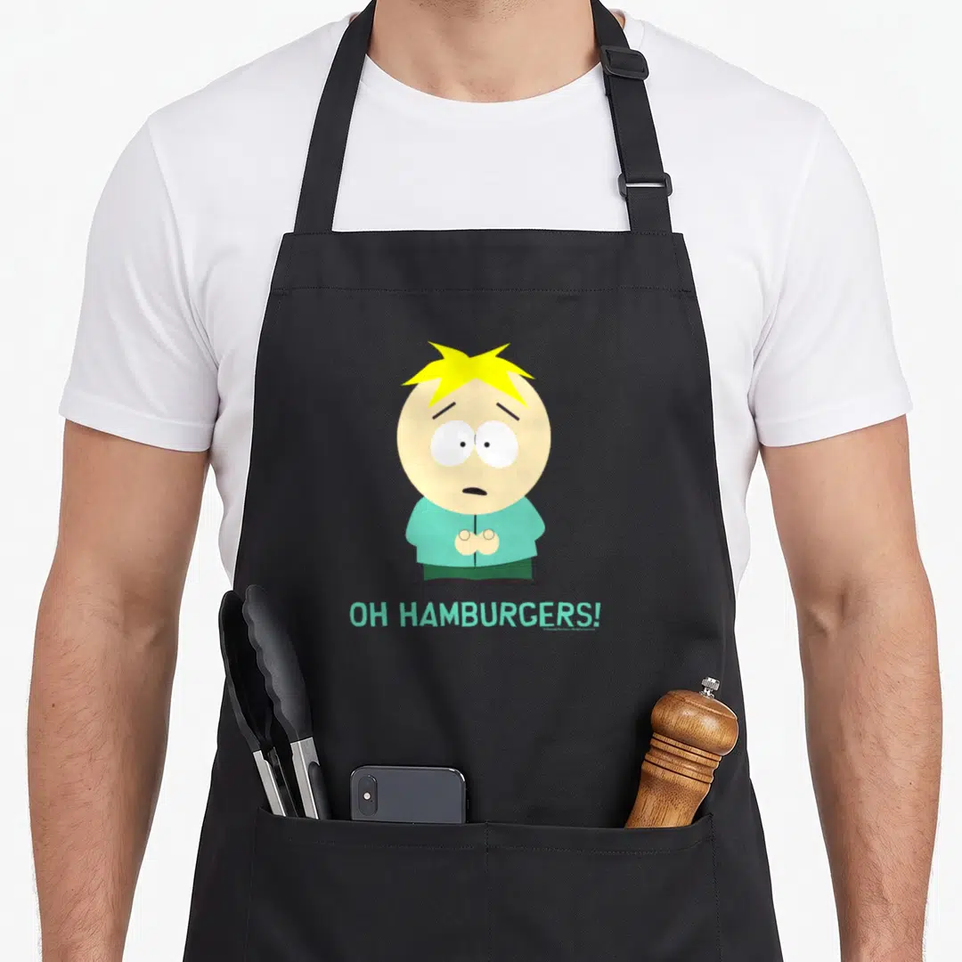Hamburger butter apron - Cartoon boy with yellow hair and OH HAMBURGERS text in light blue — shown on a black cotton canvas apron against a white background