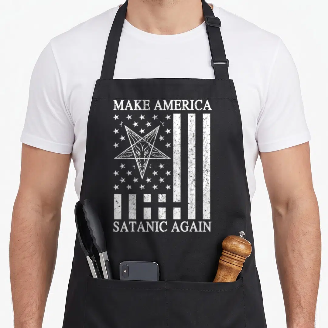 Satanic satay apron - Distressed white Baphomet pentagram and stripes with text Make America Satanic Again — shown on a black cotton canvas apron against a white background
