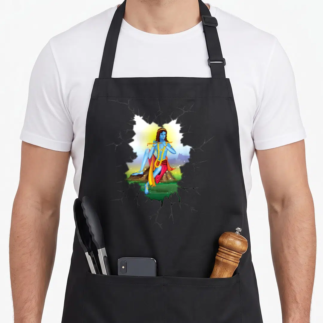 Krishna diwali apron - Realistic blue Krishna sitting on rock playing flute through jagged grey wall — shown on a black cotton canvas apron against a white background