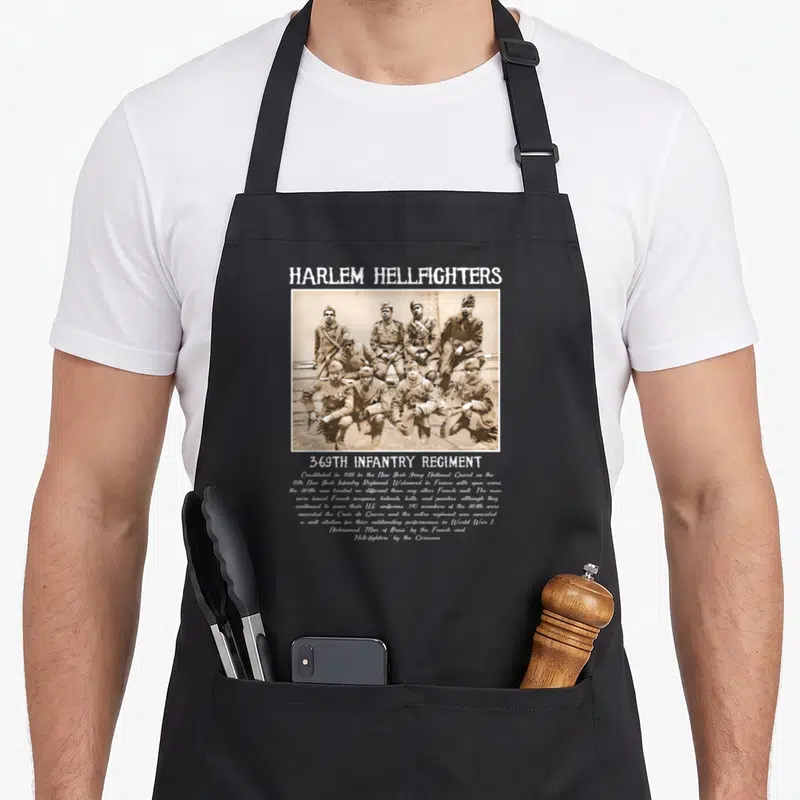 Wwi military apron - Sepia photo of 369th Infantry Regiment soldiers with Harlem Hellfighters text and history — shown on a black cotton canvas apron against a white background