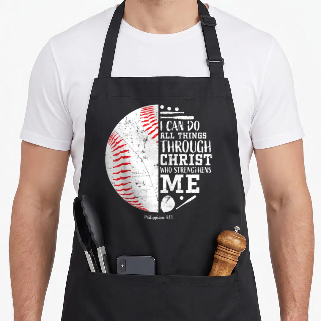 Baseball christian apron - Distressed white baseball with red stitching and I Can Do All Things Through Christ text — shown on a black cotton canvas apron against a white background