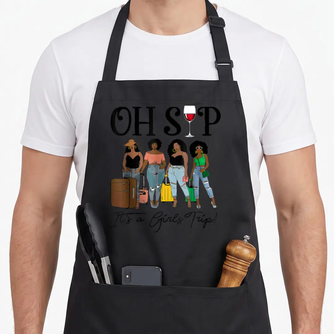 Sip wine apron - Four women with suitcases under OH SIP text and wine glass replacing the letter I — shown on a black cotton canvas apron against a white background