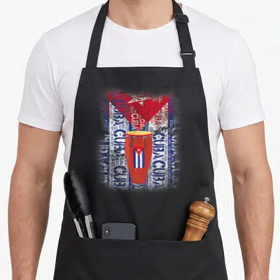 Conga salsa apron - Red conga drum with small Cuban flag on distressed background of repeated CUBA text in red white — shown on a black cotton canvas apron against a white background